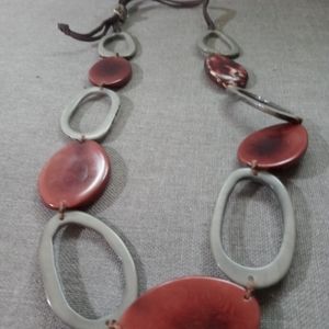 Modern silver and red long necklace with leather